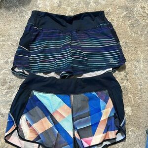 Two Athleta Running shorts Sz Small